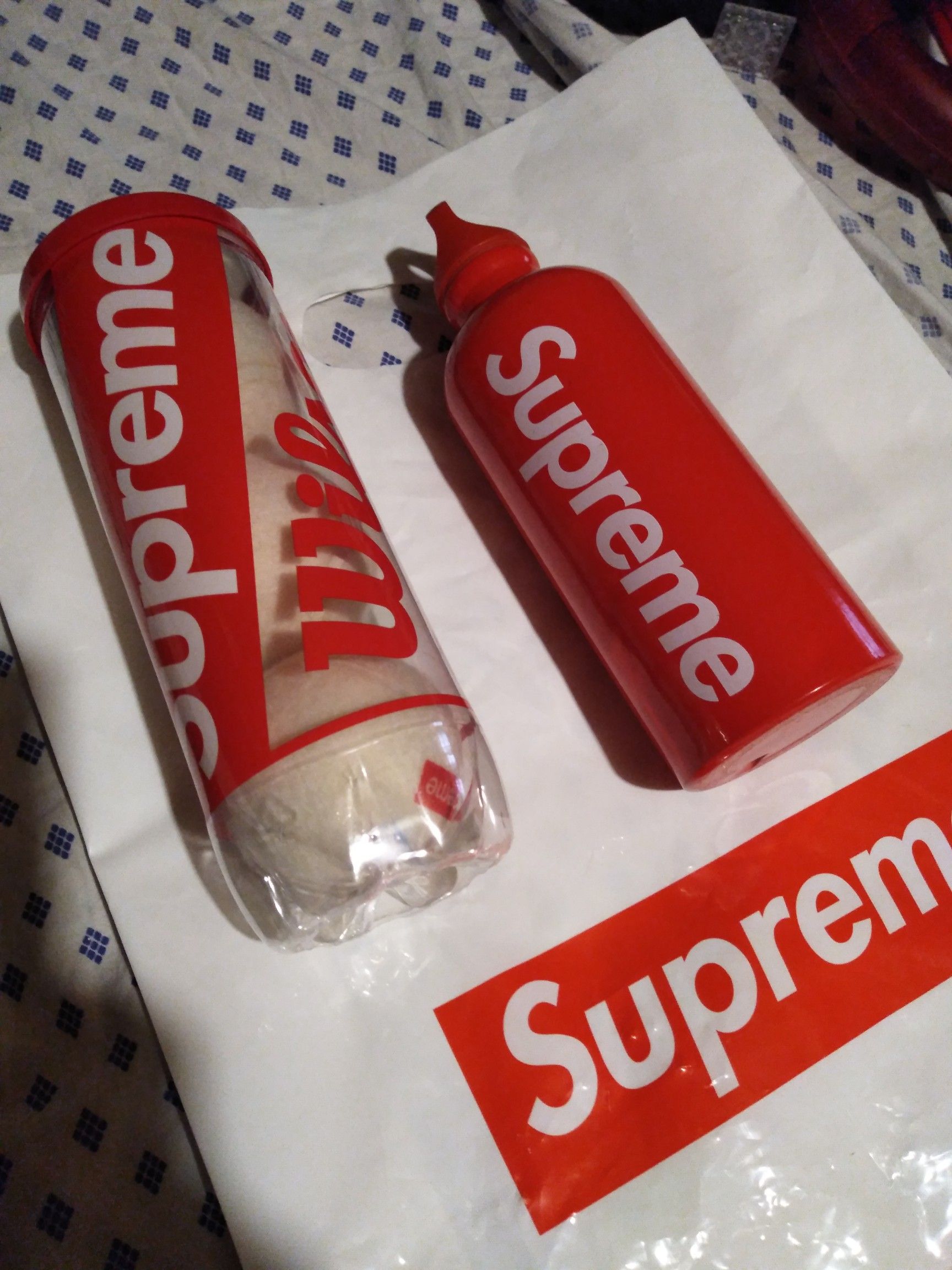 Supreme authentic water bottle and tennis balls