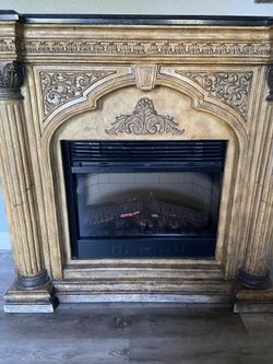 Solid fireplace from Neiman Marcus