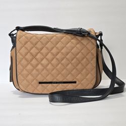 This Steve Madden shoulder/crossbody bag is the perfect addition to your collection