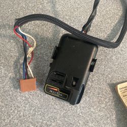 electronic trailer brake controller (manual-slide style with Hard / Soft settings).