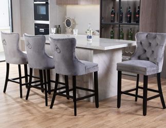 Four bar stools or dining chairs