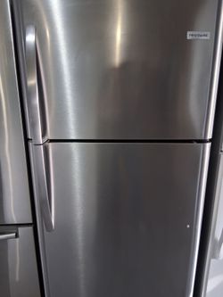 Frigidaire stainless steel top and bottom apartment side fridge fully functional