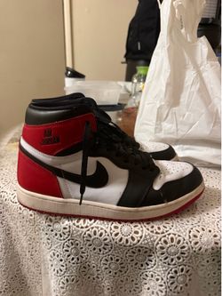 Black and red Jordan 1s