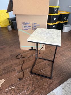 End table with plugs