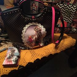 Beautiful and Shiny Nicole Lee Purse Witn A Phone Wallet