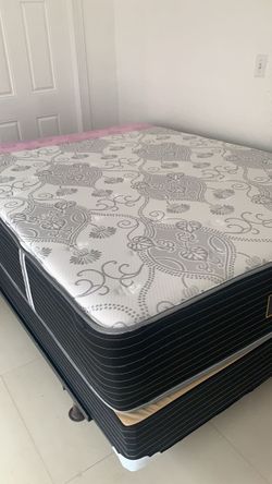New queen mattress and box spring 2 pc bed frame is not included