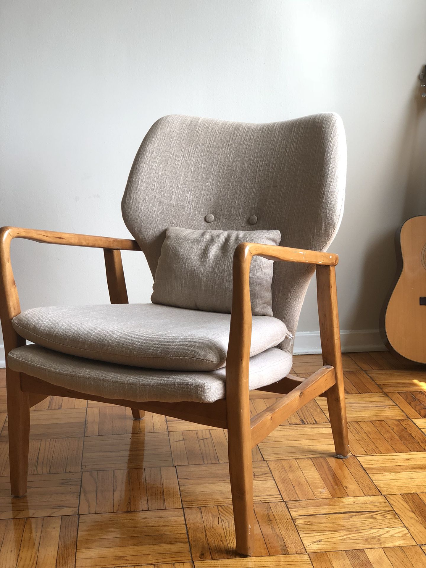 Midcentury chair with pillow