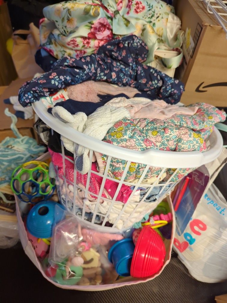 Basket Of Baby Girl Clothes