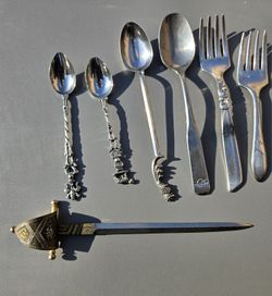 vintage Italian silver-plated cocktail utensils and a decorative sword Letter Opener
