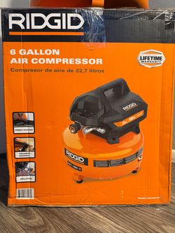 RIDGID 6 Gal. 150 PSI Portable Electric Oil-Free Jobsite Pancake Air Compressor with Dual Pressure Gauges and 2-Quick Couplers