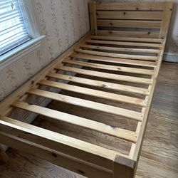 Twin slatted wood bed frame