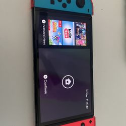 OLED Nintendo Switch With Game 