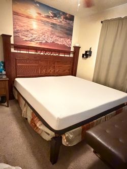 California King bedroom set featuring a wooden headboard designed to be wall-mounted, separate from the bed.