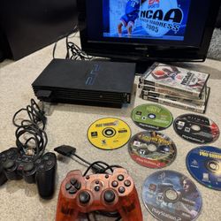PlayStation 2 with 10 games two controllers and memory card