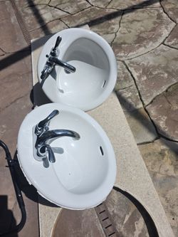 2 Bathroon Sinks And Moen Faucets