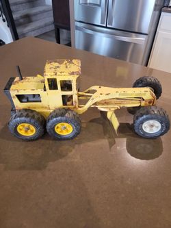 Tonka yellow pressed steel MR-970 Road Grader