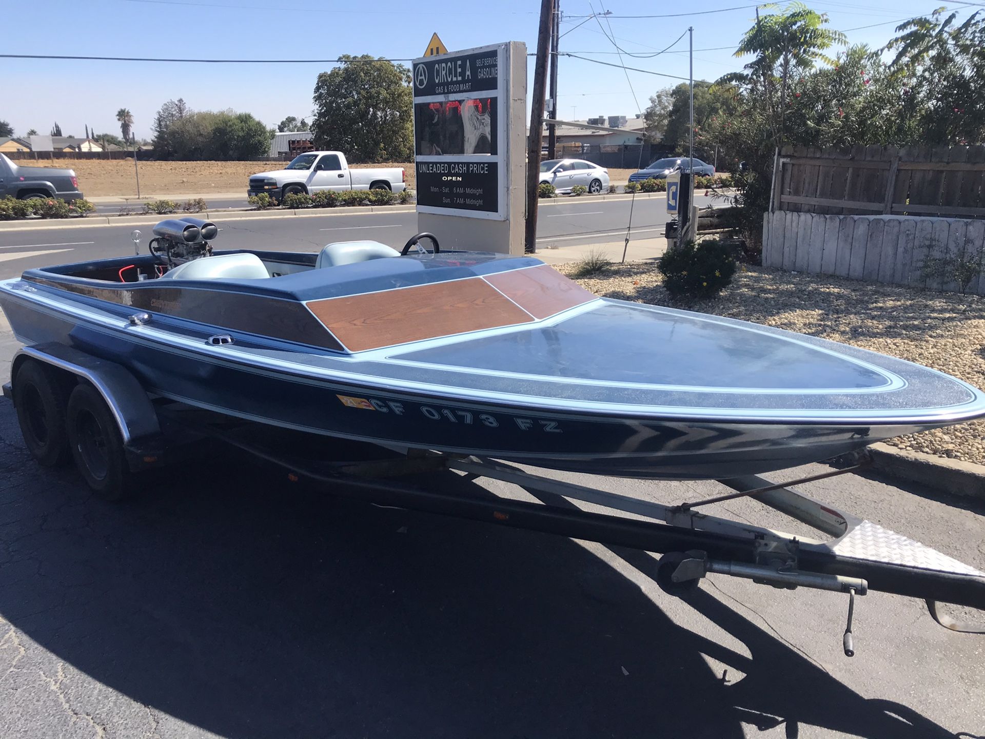 1977 Cheyenne be jet boat with a panther jet pump 460 big block twin carburetor high-rise aluminum intake with the riser plate in a tunnel ram very c