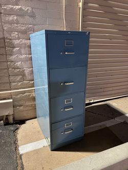 FREE 4 drawer blue filing cabinet