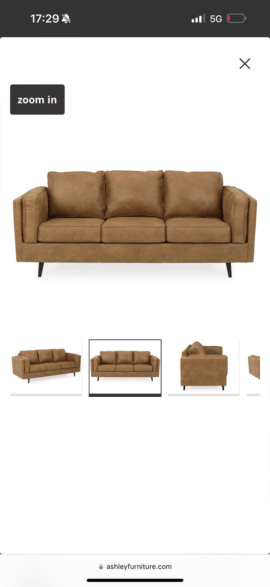 Brown three-seater armchair.. Very good condition.