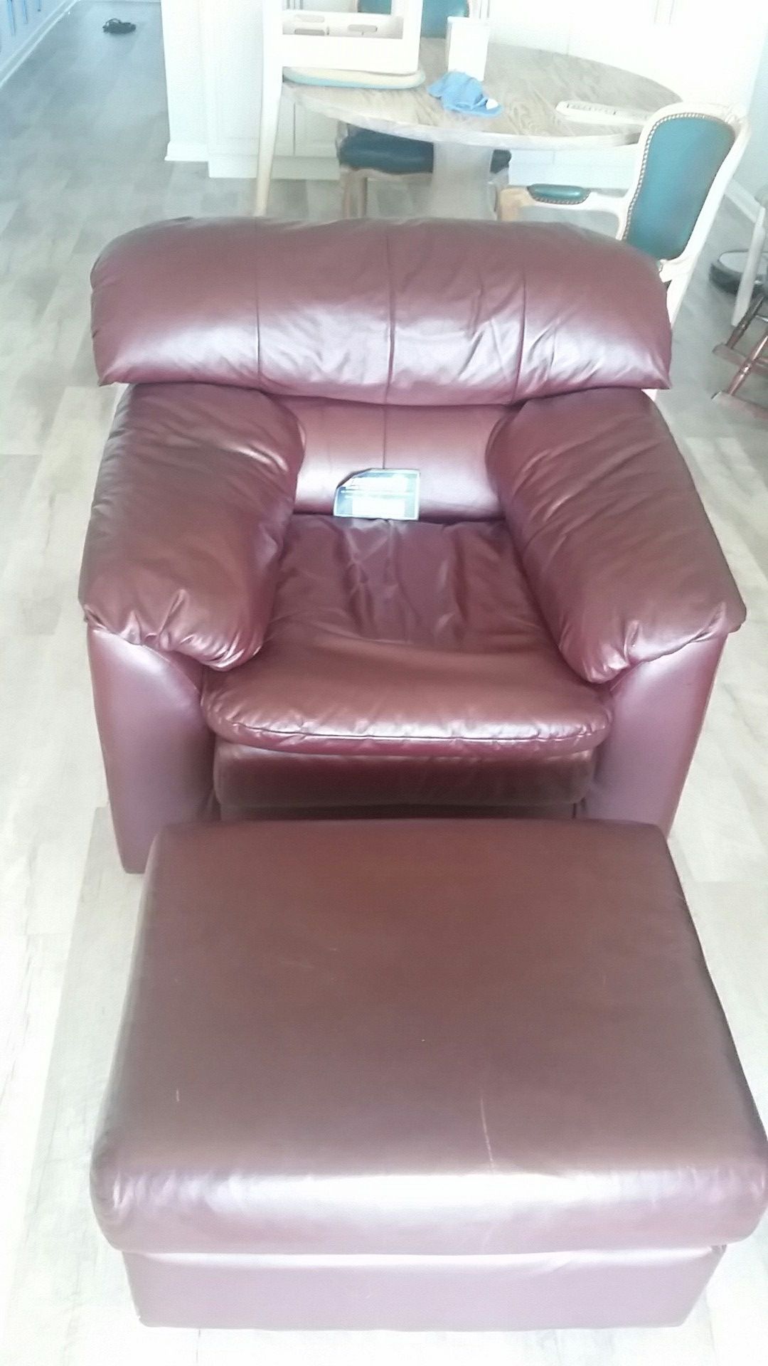 Leather chair & ottoman bt Thomasville