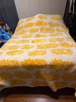 Queen-size blankets typically measure 90 inches by 90 inches