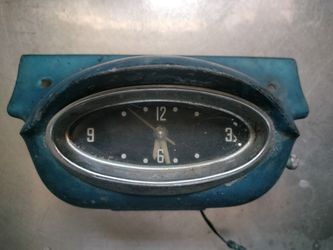 Vintage 57  Oldsmobile dash clock