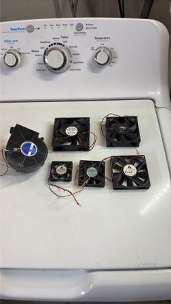 12 volts. Fans.  For electronic project
