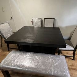 Casual dining room set, with a modern rustic design.