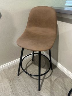 Faux Brown / Tan Leather Swivel Chair