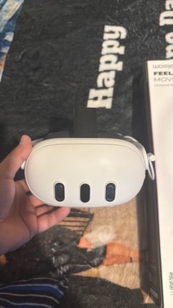 Meta Quest VR Headset with Woojer sound vest and headphones
