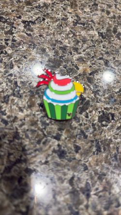 Tiki bird cupcake chaser pin