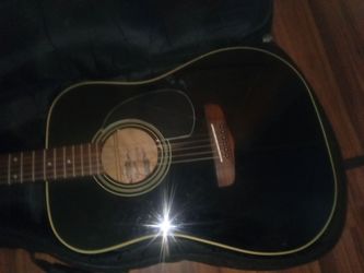 Fender acoustic guitar with case