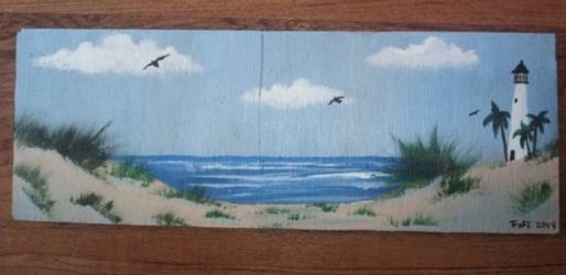 Lighthouse beach scene wood painting