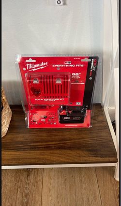 Milwaukee M18 Red lithium XC 5.0 Battery And Charger