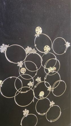 Adorable/fashionable stainless steel or sterling’ silver adjustable bangles with or w/out pendent from $10-$15. Each