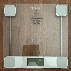 Glass digital scale with easy-to-read display.