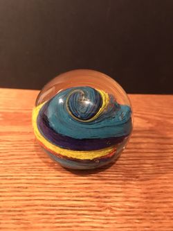 Colorful swirled glass paperweight