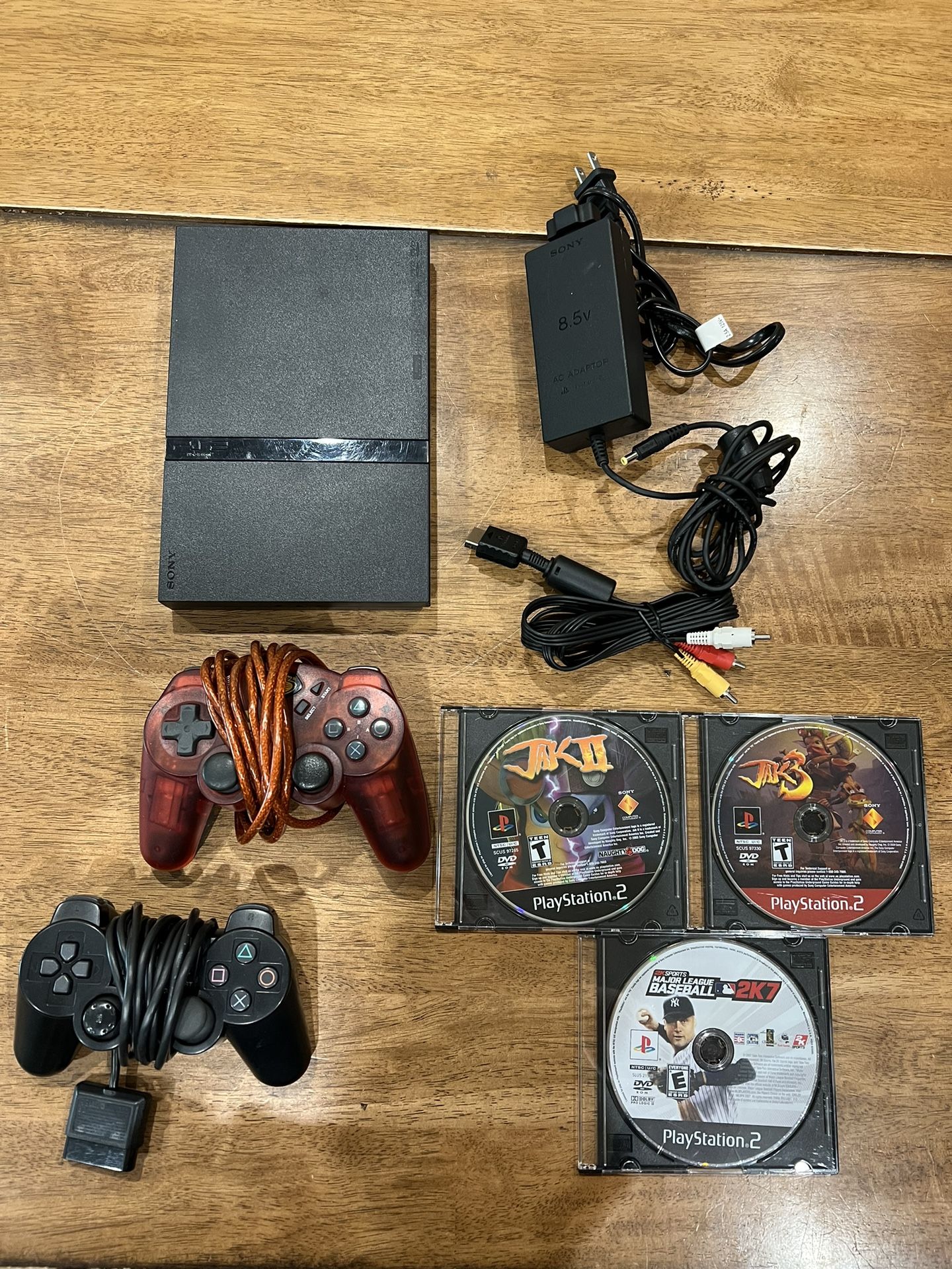 Sony Playstation 2 PS2 Slim SCPH-70012 w/ 2 Controllers, 8GB Card, and 3 Games