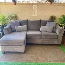 Gray Modern Brise 90” Sectional Sofa with Reversible Chaise by Ashley HomeStores