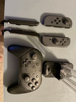 Nintendo Switch Pro controller and Joycons and charging dock