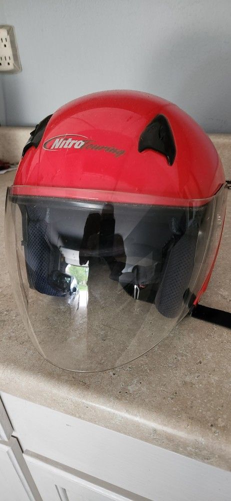 Large motorcycle helmet, $10.