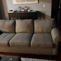 Gray couch and love seat