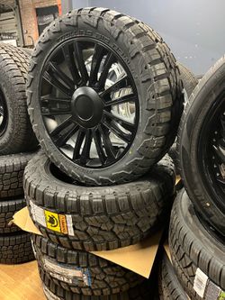 22 INCH 4 NEW RIMS. 4 NEW TIRES. MOUNTED. BALANCED. READY TO GO.