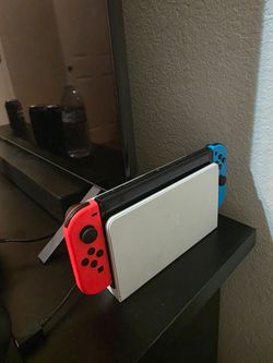 Nintendo Switch OLED with Neon Joy-Cons