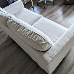 IKEA Sofa Width: 65 " Height including back cushions: 33 7/8 "