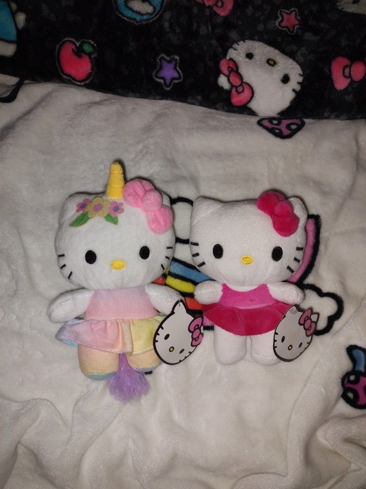 Two Hello Kitty Plush Toys