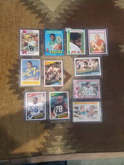 11 Old Football Cards.