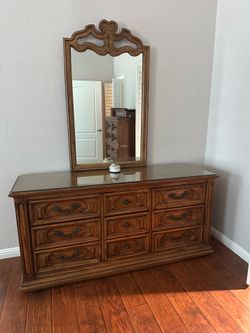 Thomasville provincial style fruitwood dresser features a protective glass topping dresser solid wood