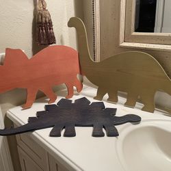 dinosaurios de madera  grandes muy bonitos para colgar en la pared $20dls