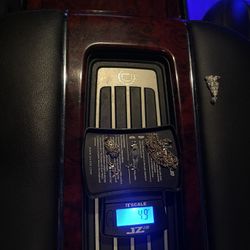 4.9 GRAMS OF 14K GOLD 4.2 GRAMS OF 18K GOLD 